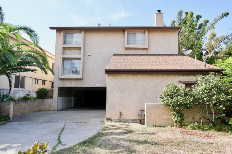 A two-storey house in the Locust Street Condos community.