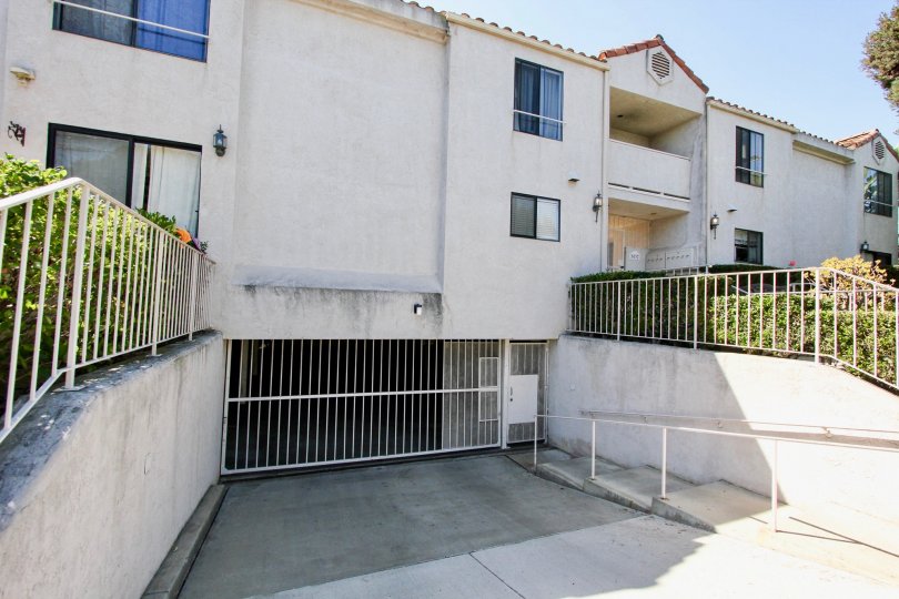 Underground parking with gated access and safety railings at the Roseville Terrace