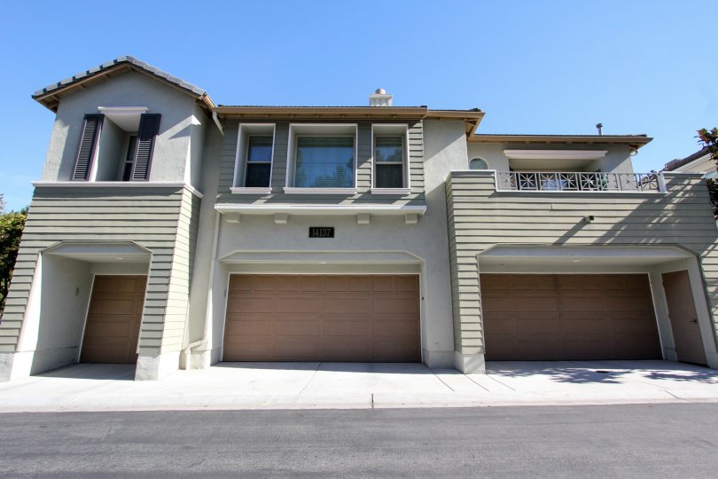 a two storied house with two garage an two entrance at Cypress Greens. Rancho Bernardo at California