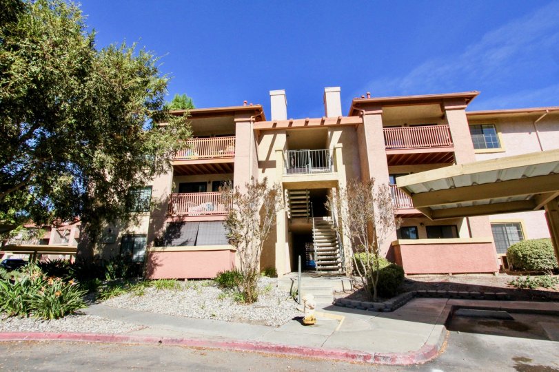 Yellow color building in California State in Community of Il Palio in city of Rancho Bernardo during daytime