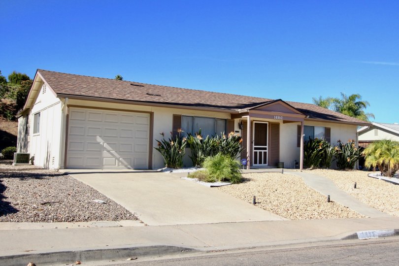 Home in Seven Oaks has great landscaping with nice rock