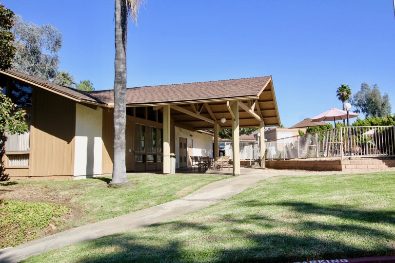Side open space view with chairs and table of Fairway Knolls community, San Marcos, CA