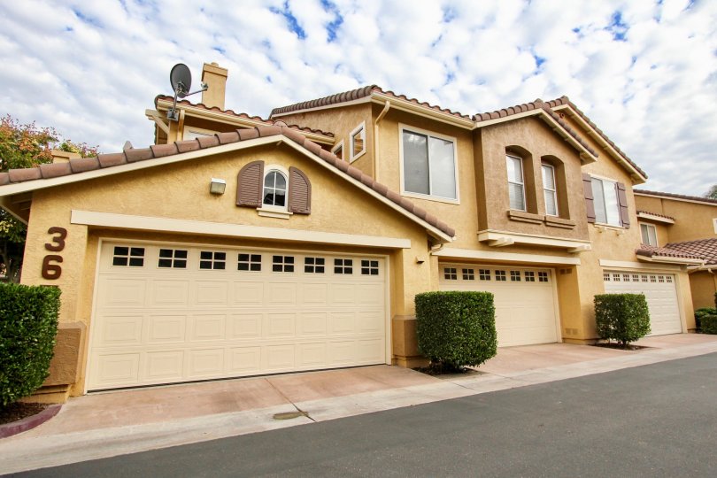 3 garages outside a large home at California Mariposa in Santee California