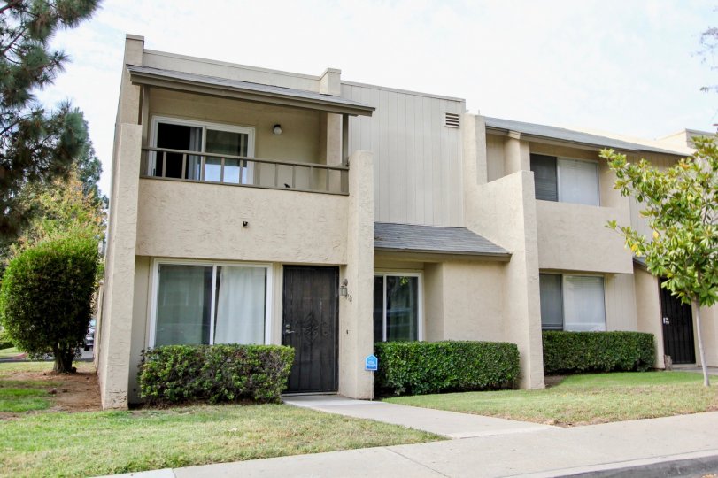 A front view of an apartment building in Corsican Villas.