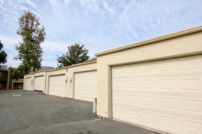 Long shot of light yellow garage doors in Santee, California