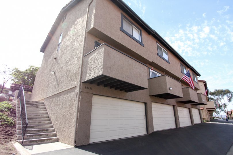 Three story housing with patios and garages at Riderwood Terrace in Santee CA