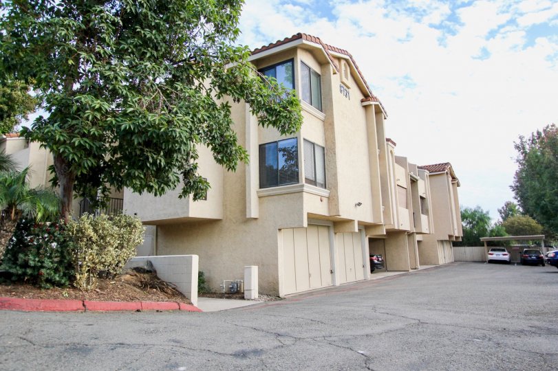Driveway next to three story residential complex at Town Villas in Santee California