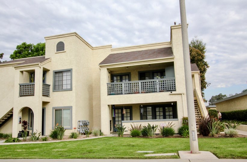 The front of a modern apartment home building with spatious balconys in Vista Del Rio
