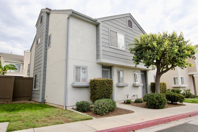 A two-storey residence with grayish tone in the Ashford Park neighborhood.