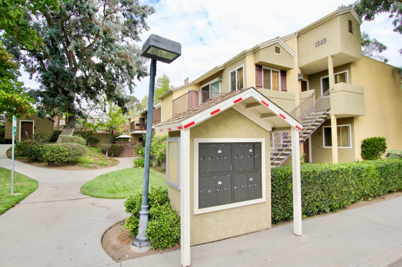 A front view of the sunny Canyon Villas complex in lovely Spring Valley California.