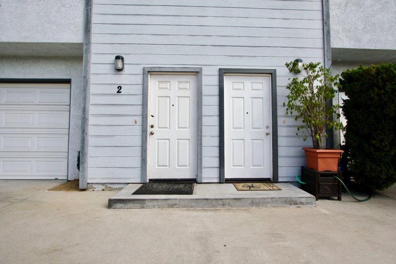 Goodland Acres ,: Spring Valley, California, white door,potted plant