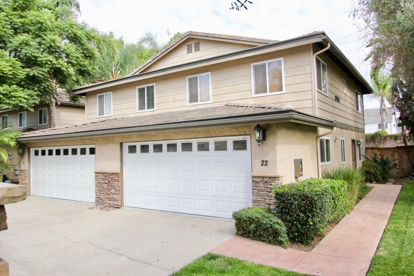 Front garage and open space view of Lamar Square community, Spring Valley, CA