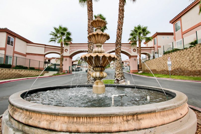 A beautiful day in Pointe Lakeview with a small water fall.