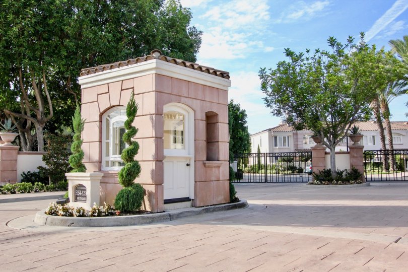 Entrance of the building decorated with trees plants in Casabella