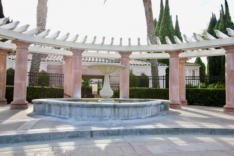 Awesome fountain decorated with plants and trees in Casabella