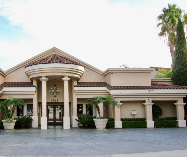 Front view of the buildings decorated with plants and trees in The Venetian