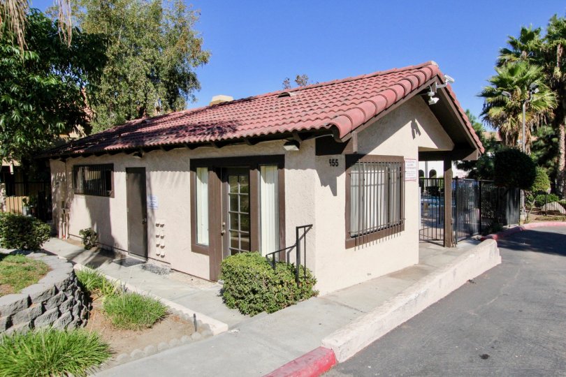 A sunny day at Buena Vista Townhomes with a beautiful home