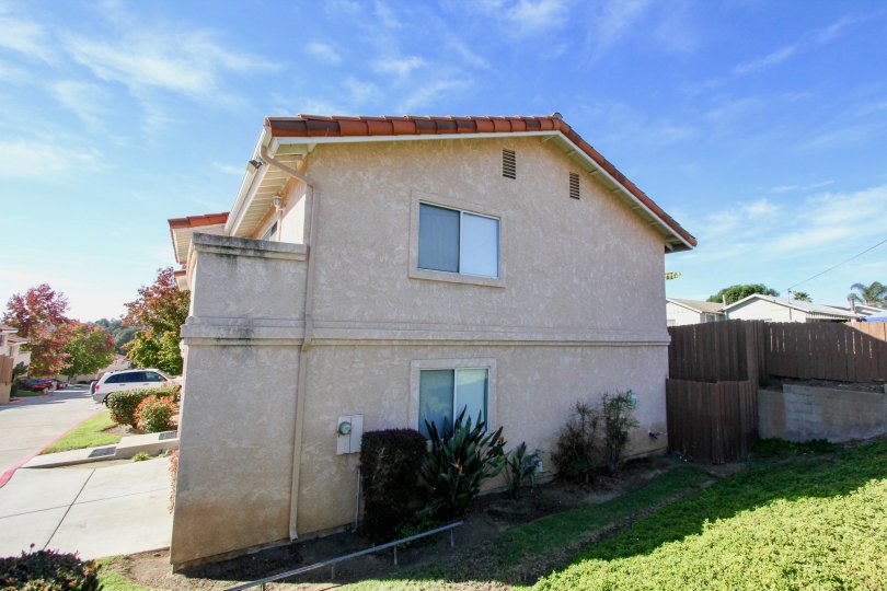 Two story housing with driveway at Hillview Townhomes in Vista California