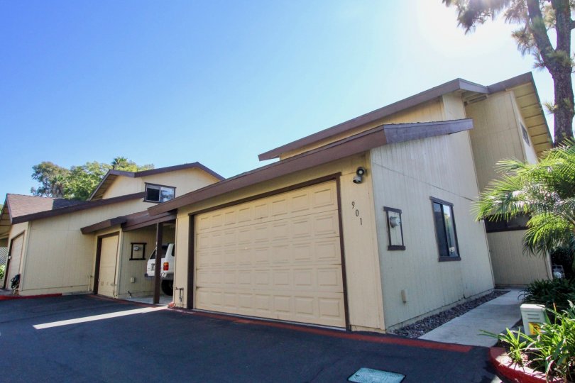 A clear sunny day in Marlin Terrace community with a beautiful house with a car parked.