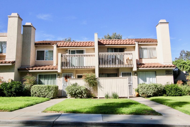 A sunny day in the area of Vista De Vista, condo, grass, chimney, porch, gated doors
