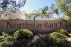One of the Northstar Ranch marquees is covered by foliage