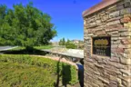 Ledgestone Column with Wolf Creek Emblem
