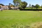 Residents of these home enjoy access to Practice area of the golf course few steps away from their back yard in Ocean Hills Neighborhood