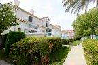 A pathway in front of a row of Townhomes at Rancho Del Mar