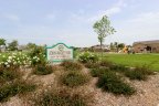 The sign for John Magee Park at Veranda