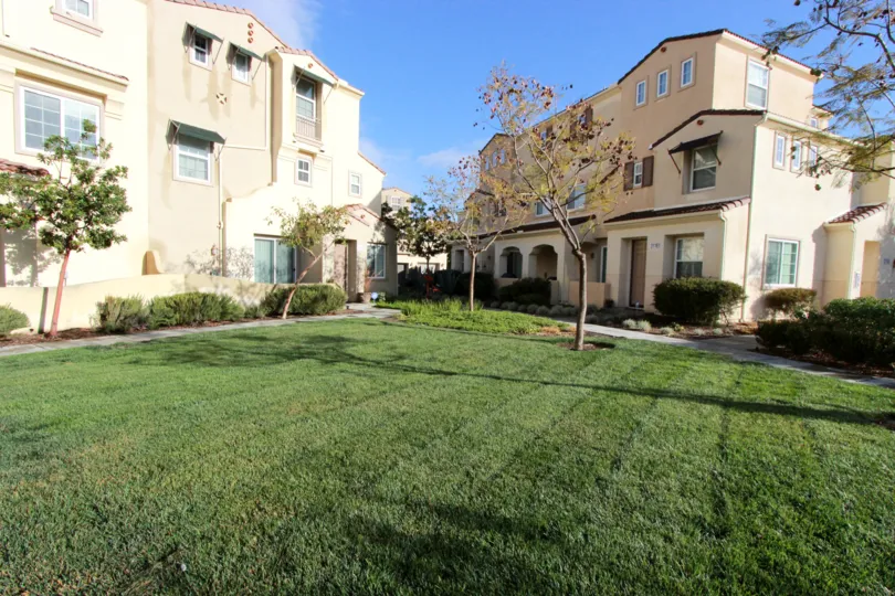 The poolside area at Temecula Lane