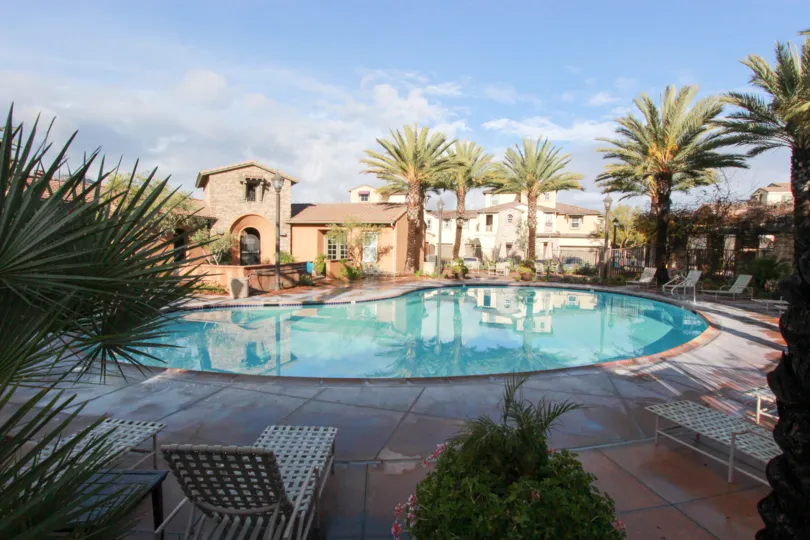 A seating area in the poolside area at Temecula Lane