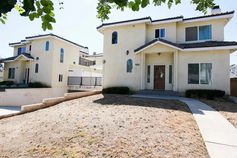 The yard in front of 103 N Electric Ave