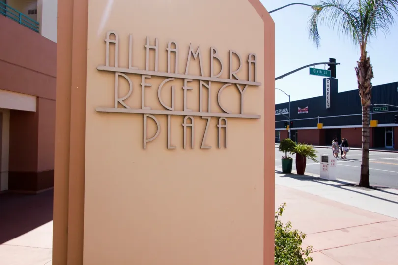 The sign announcing the Alhambra Regency in Alhambra California