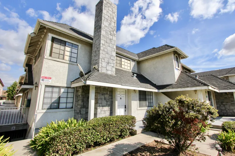 A big, beautiful house in Chinese Gardens community in Alhambra, California on a bright day