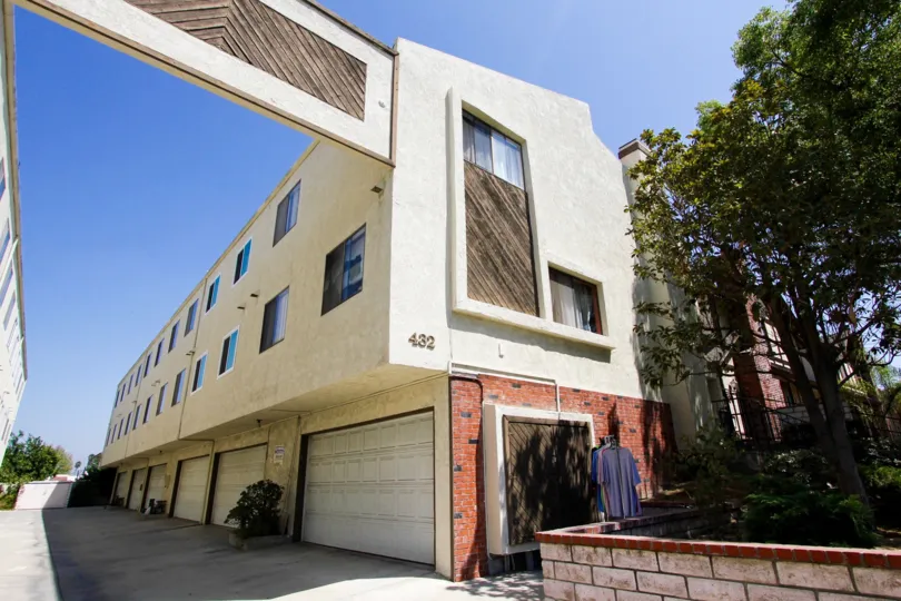 The address for Monterey Townhomes on the building