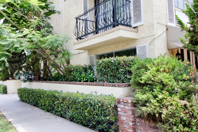 Green flowers and side view of 100 S Wetherly, Beverly Center, california