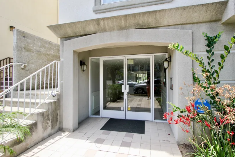 entry of home with light color and glass door in California