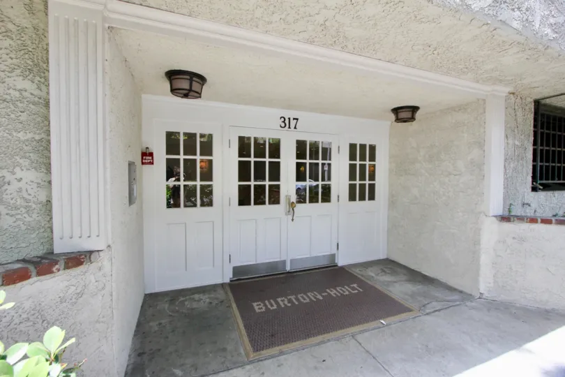 A great welcoming entrance outside of this Holt community