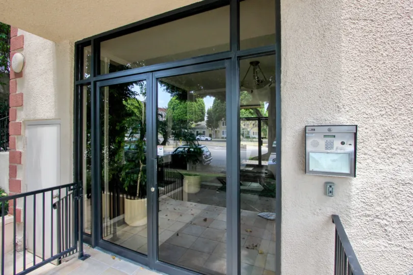 A residential entrance with code at the entrance of The Cambridge community.
