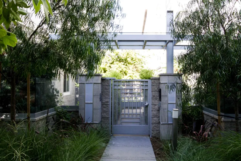 The gated side entrance into 460 N Palm in Beverly Hills