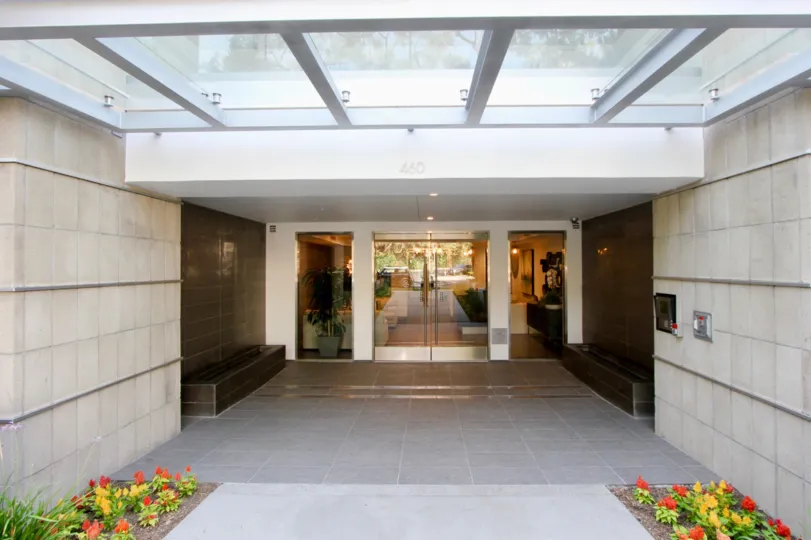 Entrance to Palm Condominiums with her classy details through the see through glass door, Beverly Hills, california