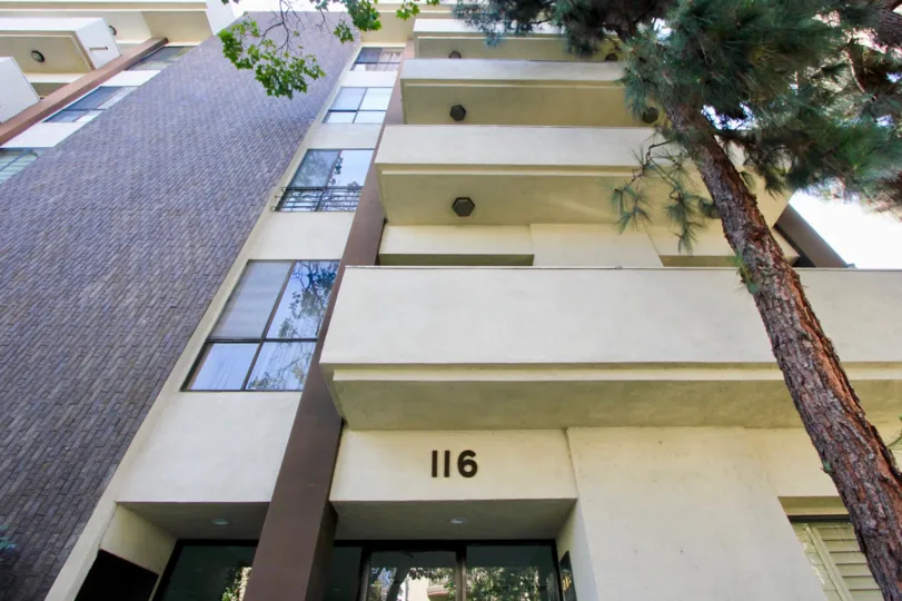 A sidewalk view of the scaling balconies at Wilshire Swall in Beverly Hills.