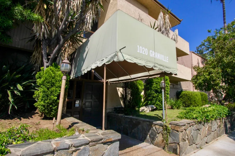 A sunny day at 1020 Granville with beautiful landscaping.