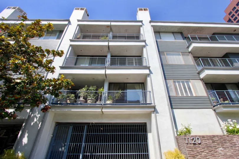 big building of white and light shades with many rooms in California