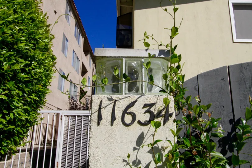 The address numbers for 11634 Gorham are mounted on a light pillar