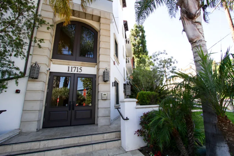 Stairs lead to the front entry of 11715 Chenault condos