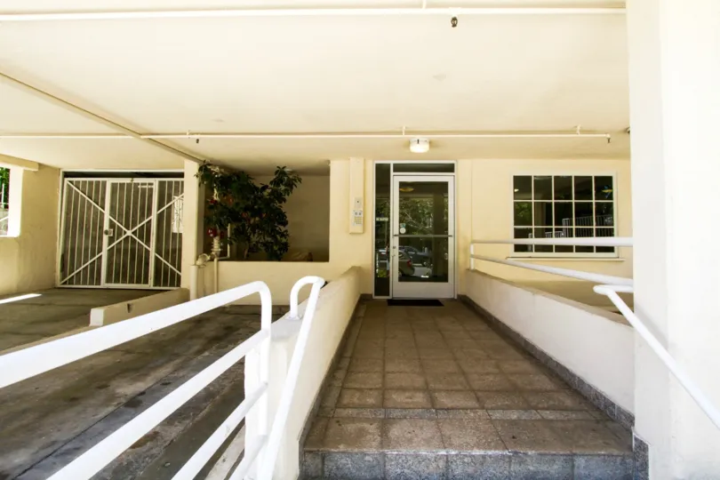 Walkway to front door of 11907 Darlington condos