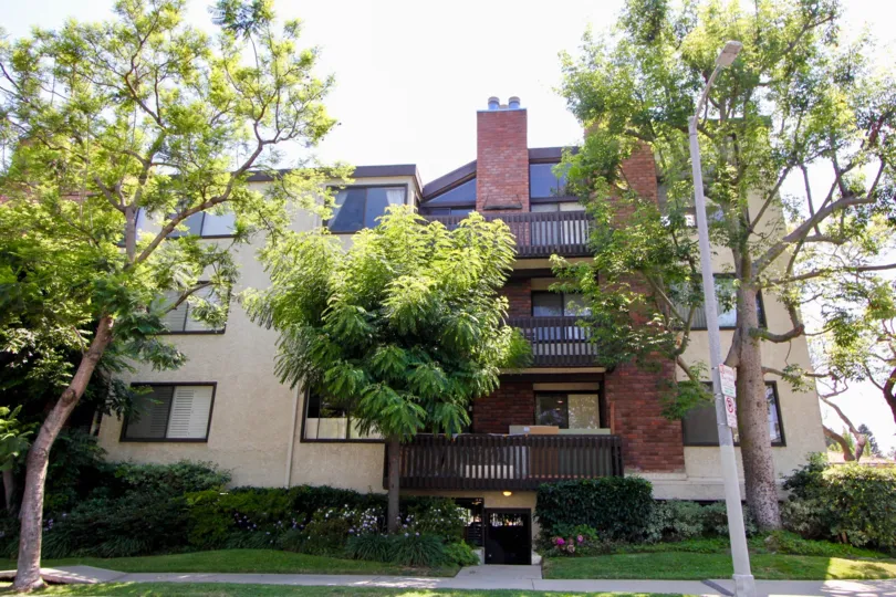 big brown building in California with many rooms for people