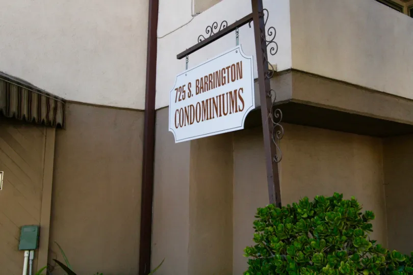Metal sign for the 725 S Barrington building