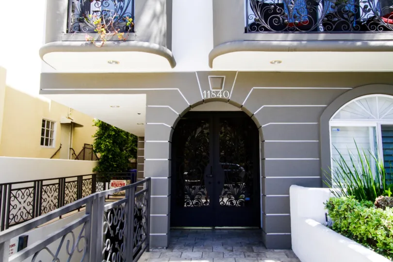 Entry to the Bellagio Villas condos through a beautiful wrought iron door